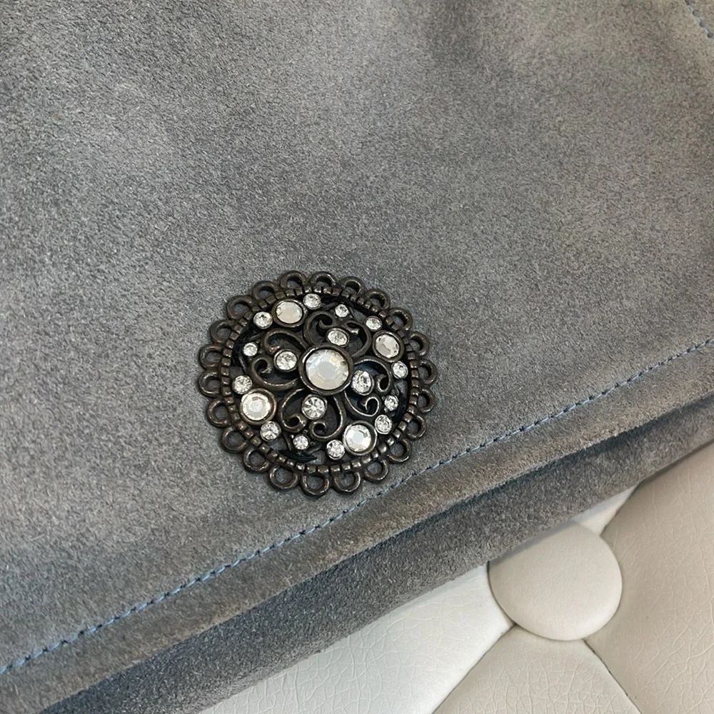 Pale blue clutch with inside zippers and vintage embellishments